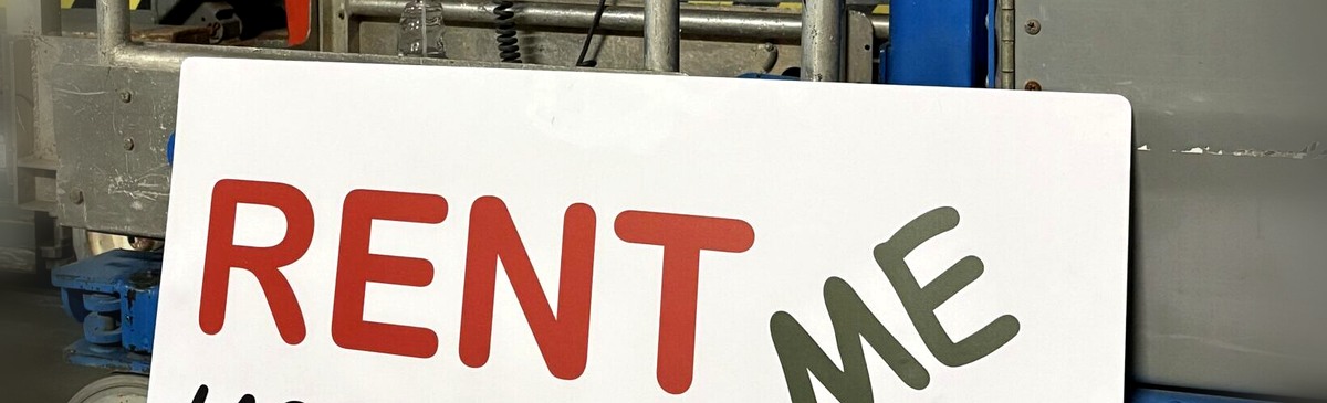 Philision Rentals Rent Me sign on a scissor lift